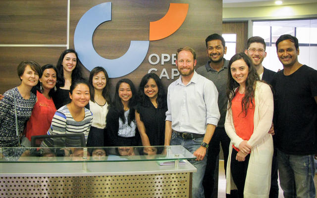 Group of MBAs in reception of Open Capital Advisors