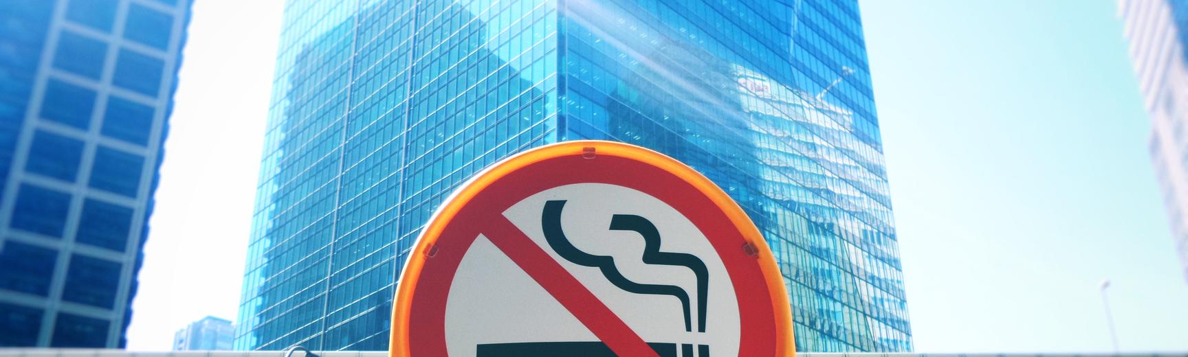 no smoking sign in front of office block
