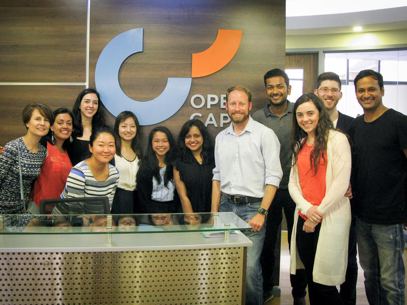 Students on the MBA Africa Trek at Open Capital consultants in Nairobi, with alumnus Holden Bonwit in the centre.
