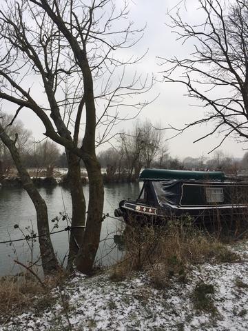 The Oxford Canal Pathway with snow on the ground